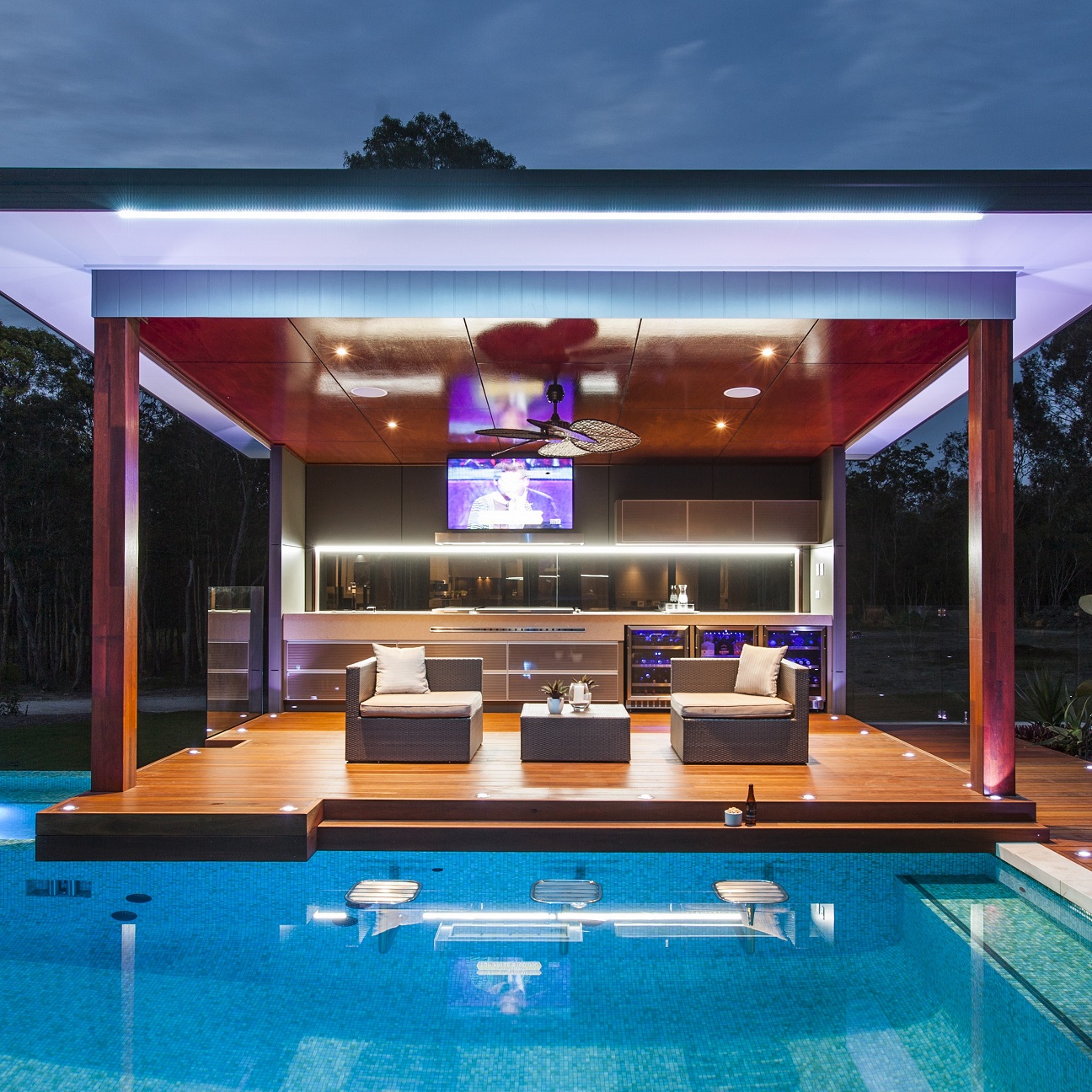 modern pool & outdoor kitchen in Best Inspiring Backyard Designs | LovelySpaces.com