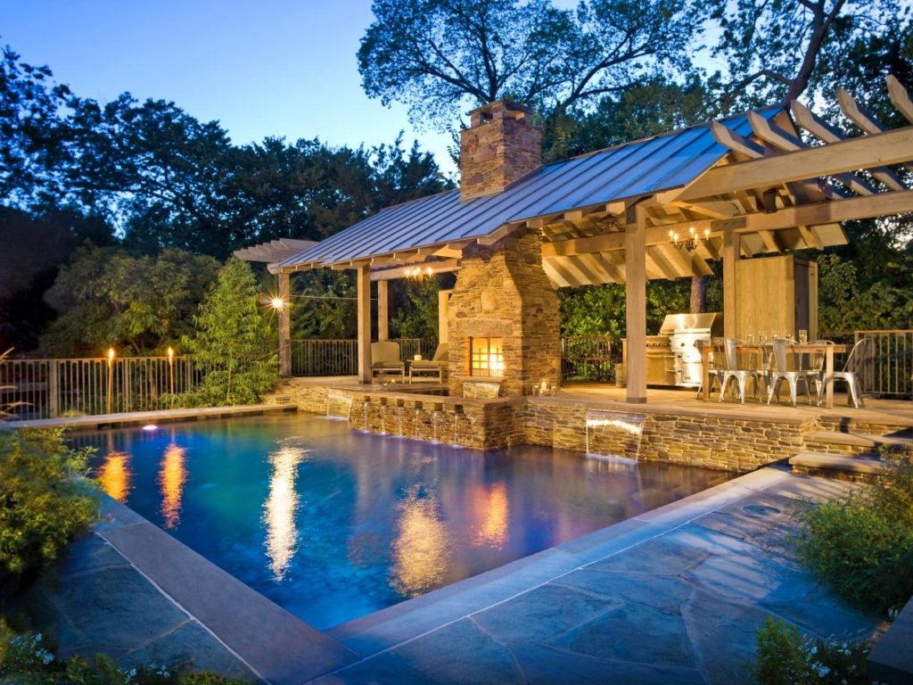 lovely pool with outdoor kitchen in Best Inspiring Backyard Designs | LovelySpaces.com