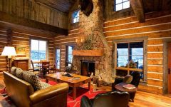 Stacked stone fireplace in cozy cabins to get lost in | LovelySpaces.com
